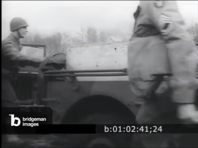 Image of WW2 newsreel 'Portable X-Ray On Duty At Front'