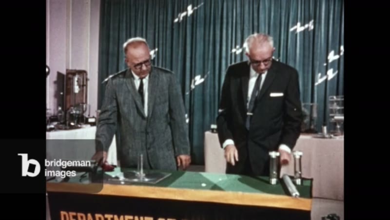 Two Men Demonstrate Static Charge by