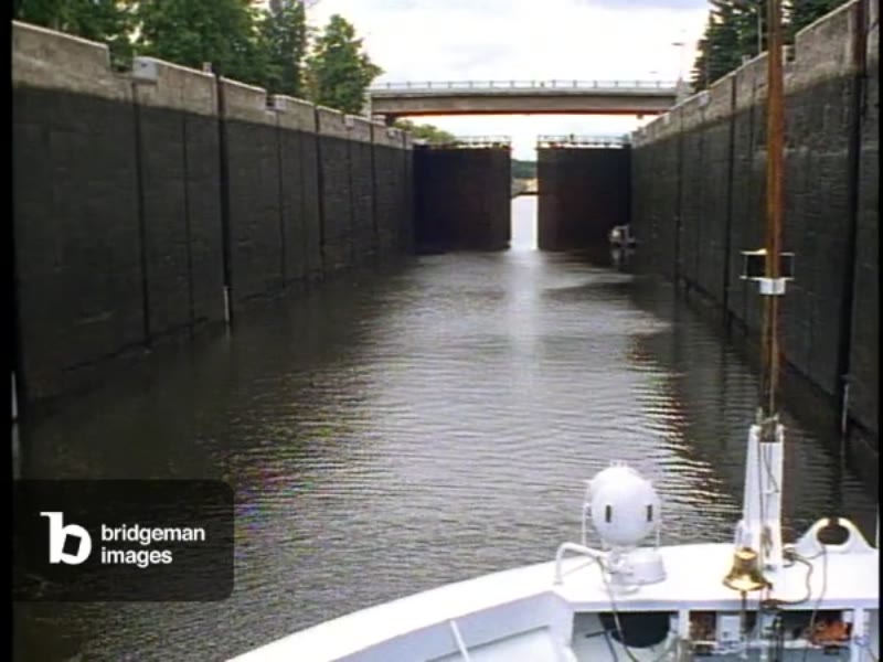 Image of Moscow Canal Lock, lock opens, medium wide shot, shot on
