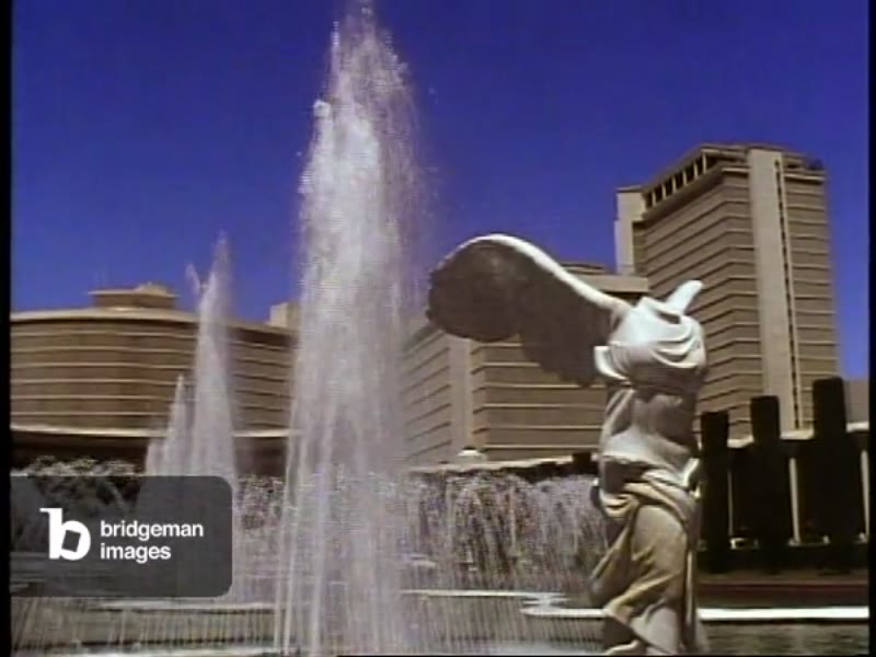 Image of Caesar's Palace exterior and fountains with Venus de Milo, wide