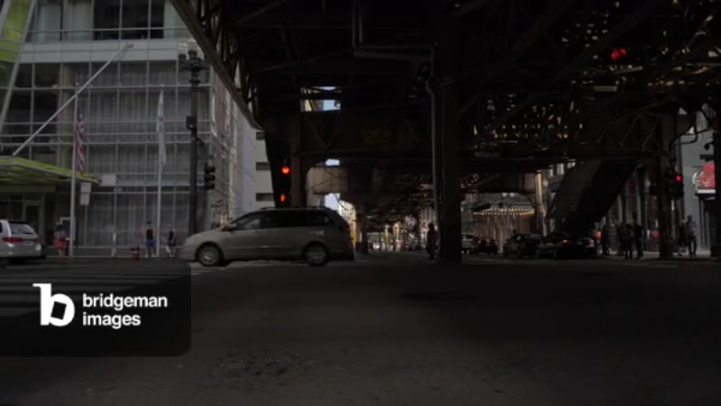 Image of Traffic under the Loop railway line on Monroe Street, Chicago,